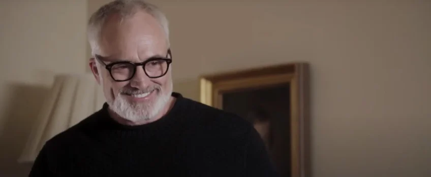 one actor smiling