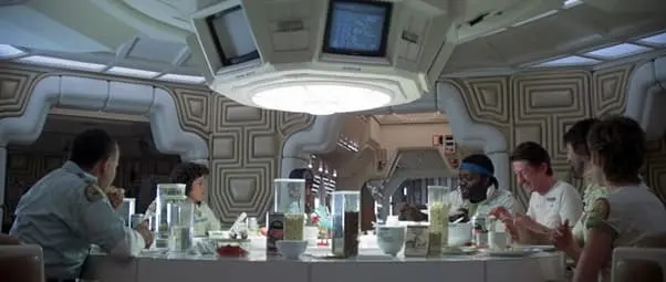 Nostromo crew conversing around the table