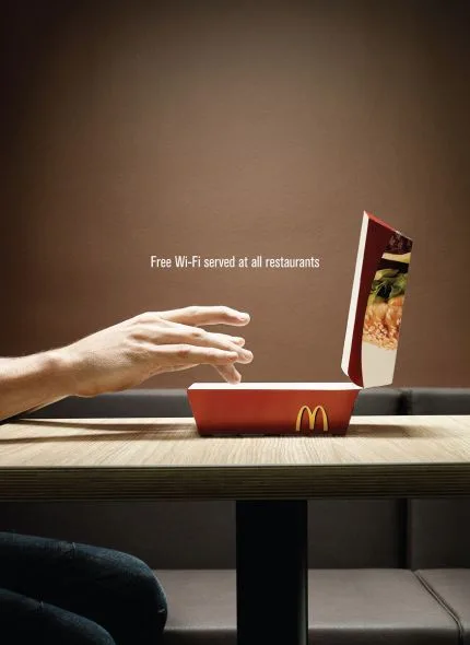 hand reaching for food in container