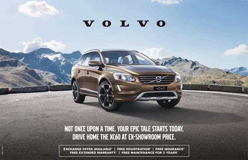 car advertisement with mountains in the background