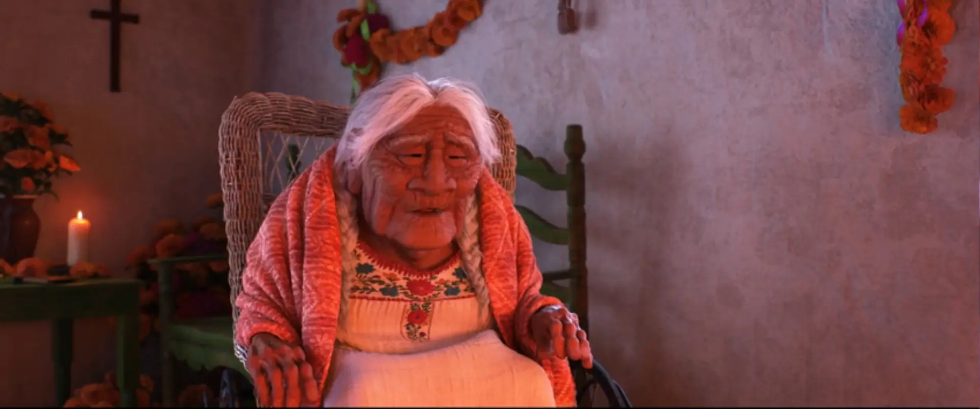 Mamá Coco sitting in her chair