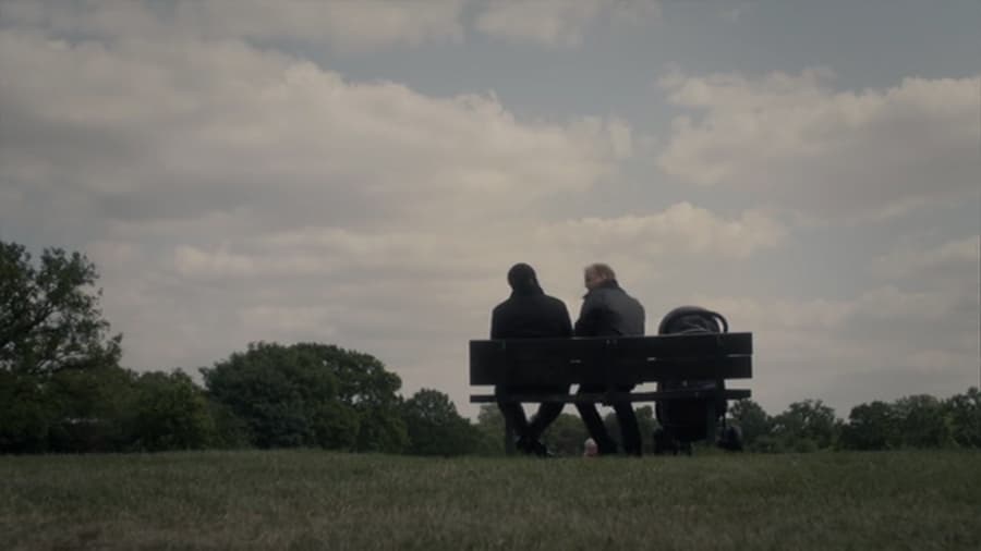 Roger and Mashinko sitting on the bench in the park