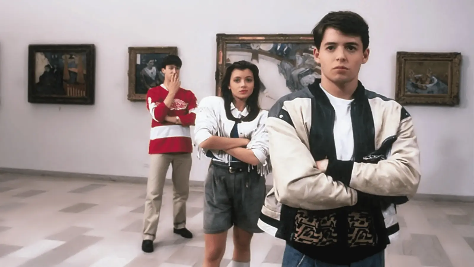 posing in front of modernist paintings