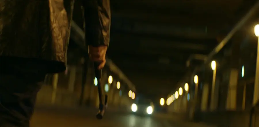 close-up of a hammer pointing at the car