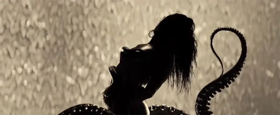 silhouette of a woman and octopus